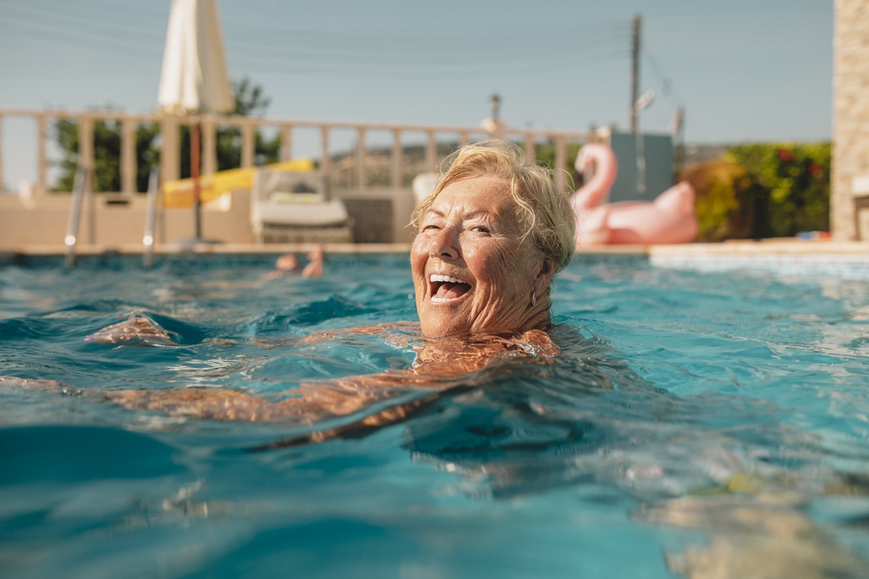 Woman swimming in a pool.