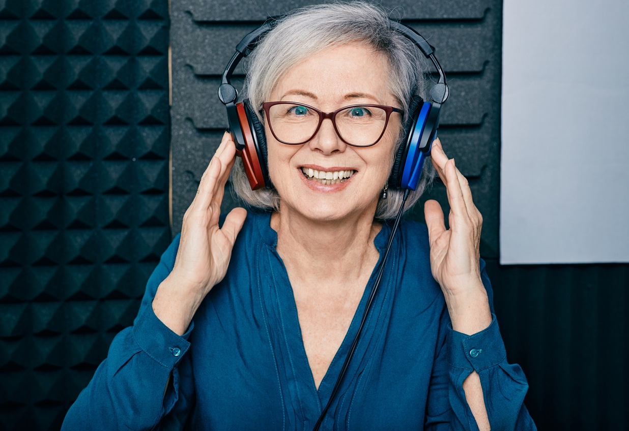 Woman excited to start her hearing test.